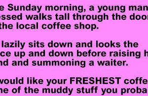 A young man walks into a coffee shop.