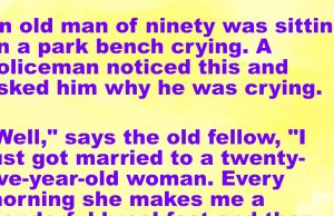 An old man of ninety was sitting on a park bench crying.