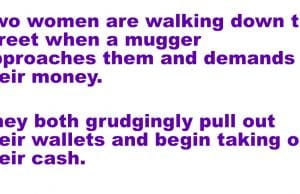 A mugger approaches two women.
